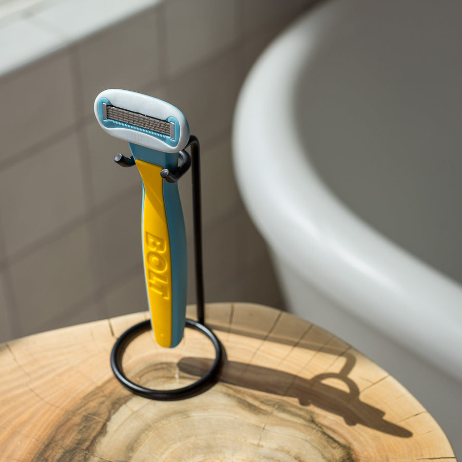 bolt performance razor on a stand in bathroom
